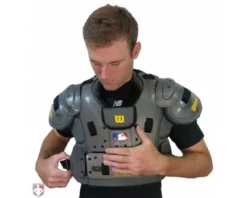 New Balance Referee And Umpire Shoes New Balance Challenger Mock Neck Short Sleeve Compression Shirt -UMPLIFE Shop TMMT717 NB Mock chest protetor being strapped on 1